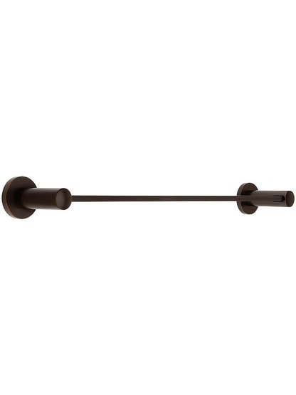18 inch Modern Brass Towel Bar with Small Disc Rosettes in Oil Rubbed Bronze.